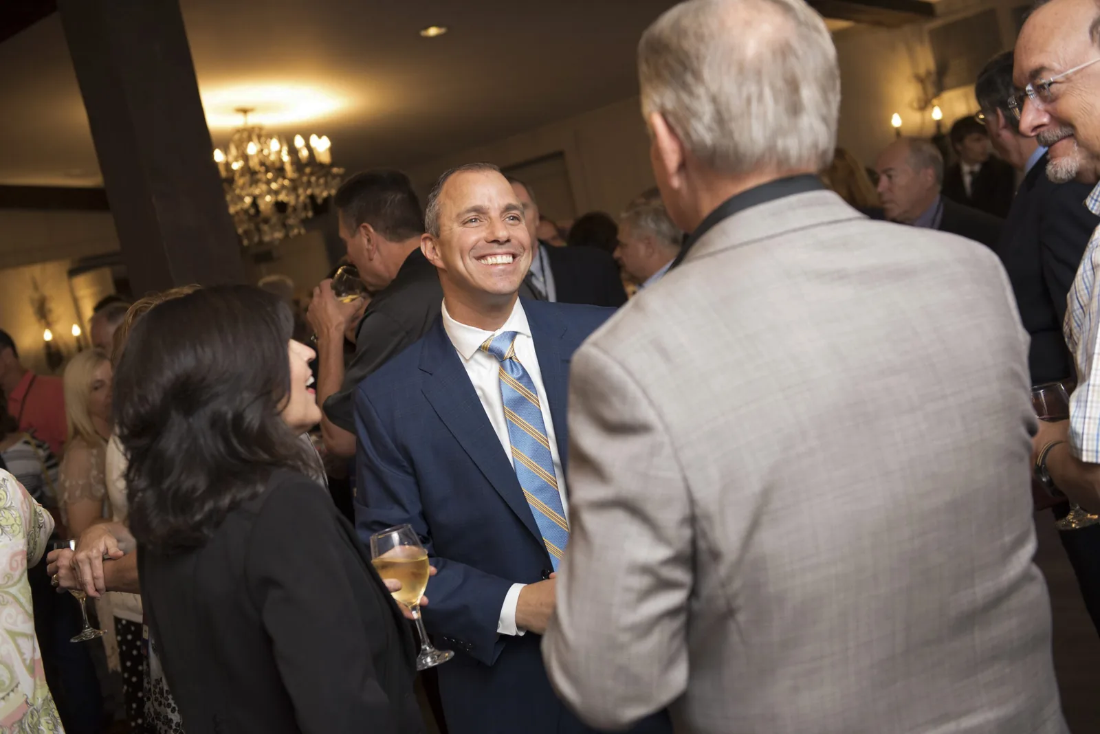 Daniel Barram meeting with retirement investment advising clients
